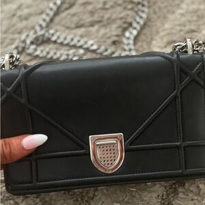 Black diorama with silver hardware